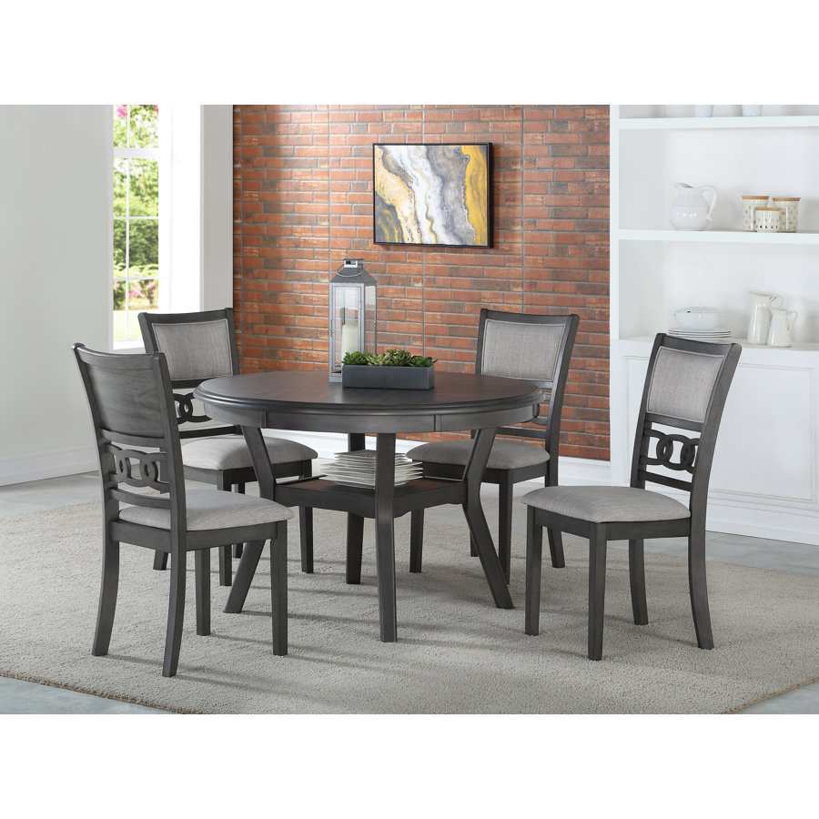 Ziemer Jackins 4 - Person Round Solid Wood Dining Set